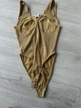 Gold bodysuit